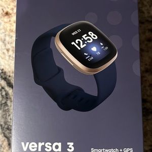 Fitbit Versa 3 brand new in box. Navy band with rose gold watch.